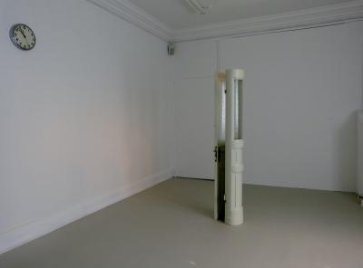 9. Alicja Kwade, Eadem Mutata Resurgo 9, (door), 2013, and Influence (wall clock), 2015.  - Installation view Monolog aus dem 11ten Stock, Haus am Waldsee, 2015. 