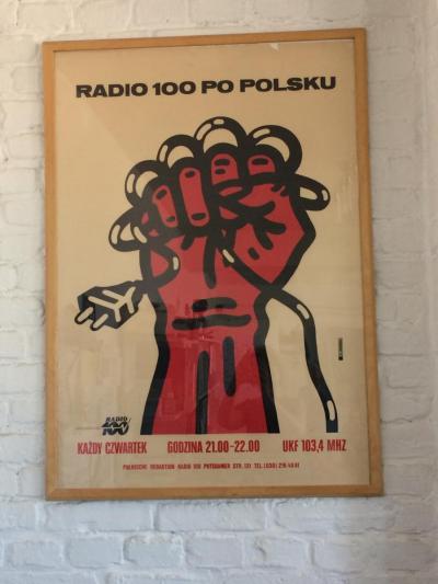 “Radio 100” poster - A “Radio 100” poster publicising a Polish-language programme. 