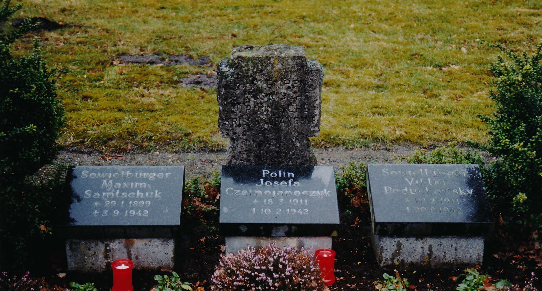 Cross with grave of the polish woman