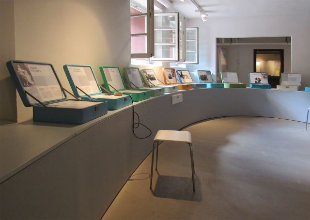 Exhibition room 1 with symbolic suitcases with biographies of the children, Bullenhuser Damm memorial site, Hamburg