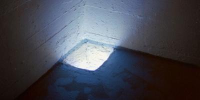 EMERGING, 1999. Video installation in the floor.