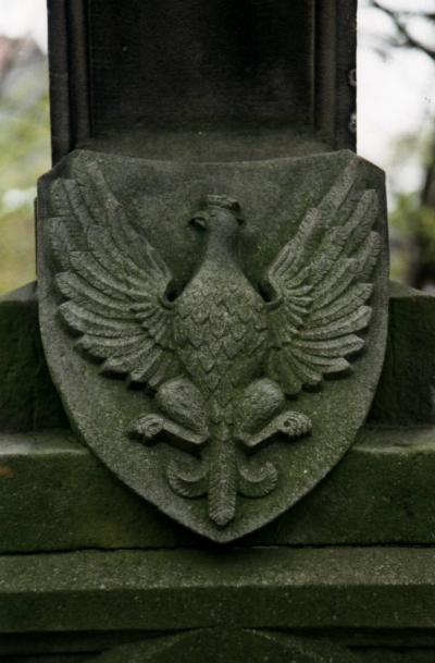 Cross and memorial slabs at the graveyard in Petershagen-Frille -  